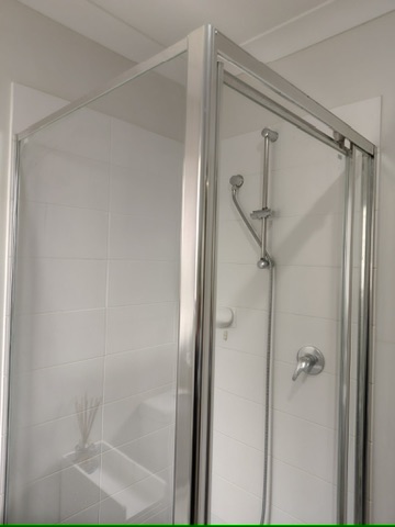 Shower screen after a detailed bathroom clean