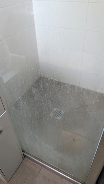 Bathroom shower before a detailed clean